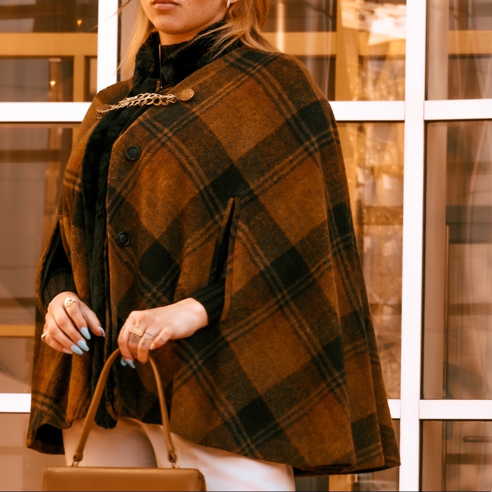 Brown plaid poncho, arm cut outs, gold attachment